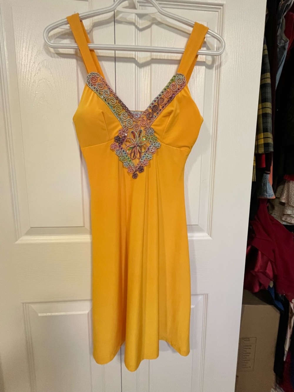 Embellished Yellow-Orange Dress
Stretchy never worn